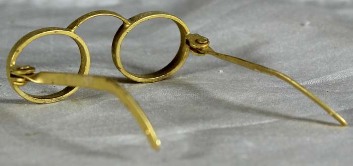 Miniature brass glasses