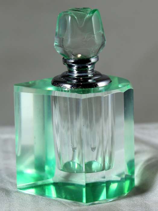 Mini green glass perfume bottle