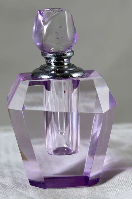 Mini purple glass perfume bottle