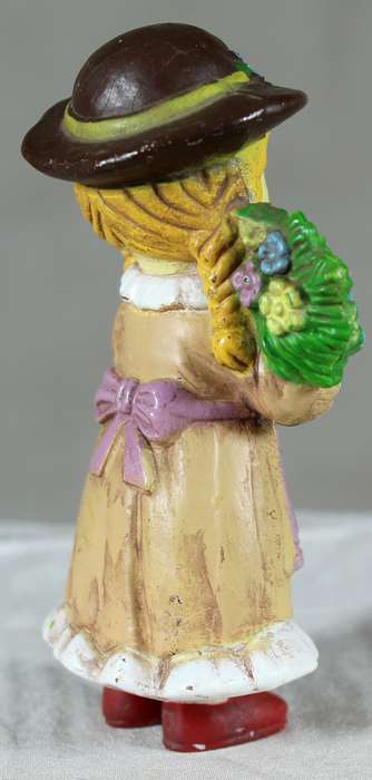 Pigtail girl holding flowers