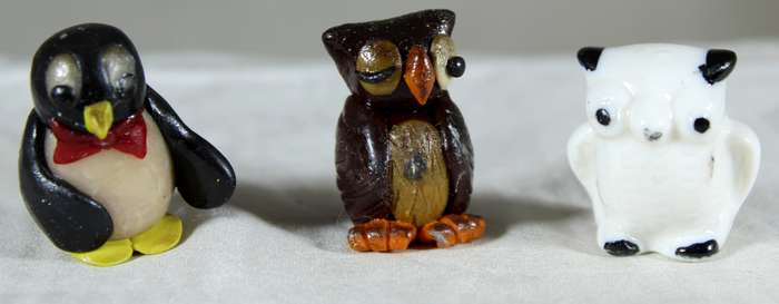 Set of two miniatures owls & a penguin
