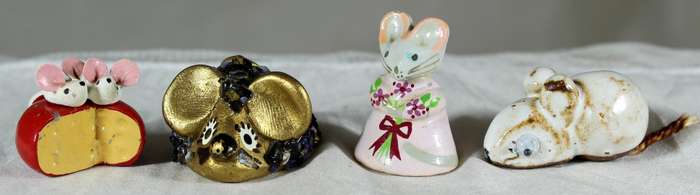 Set of four miniature mice