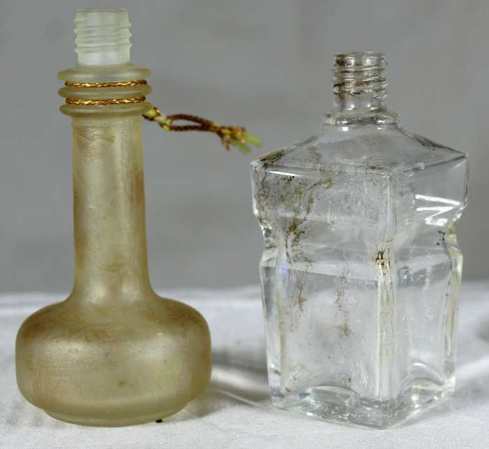 Pair of small vintage glass bottles