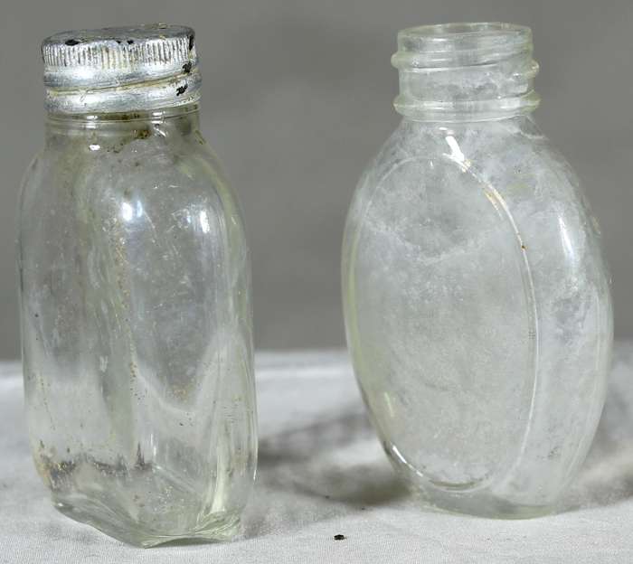 Pair of small vintage glass bottles