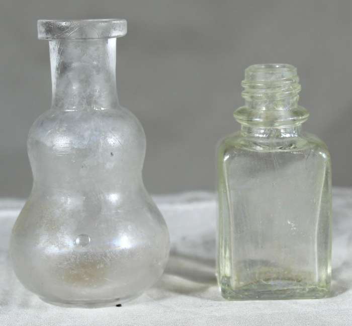 Pair of small vintage glass bottles