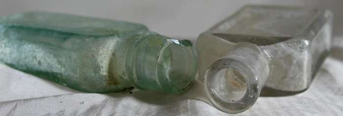 Pair of glass vintage bottles