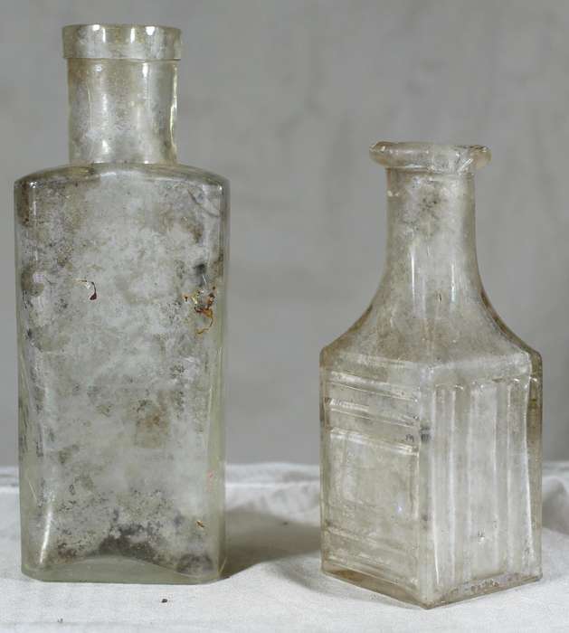 Pair of glass vintage bottles