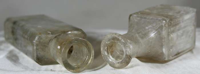 Pair of glass vintage bottles