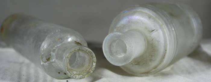 Pair of glass vintage bottles