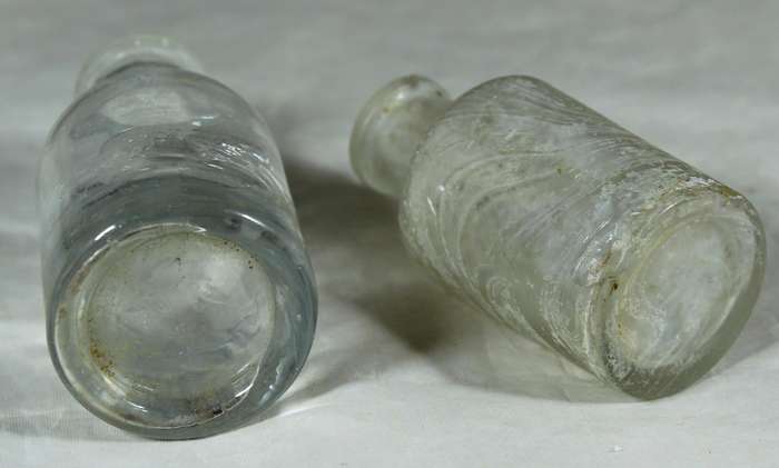 Vintage glass bottle pair