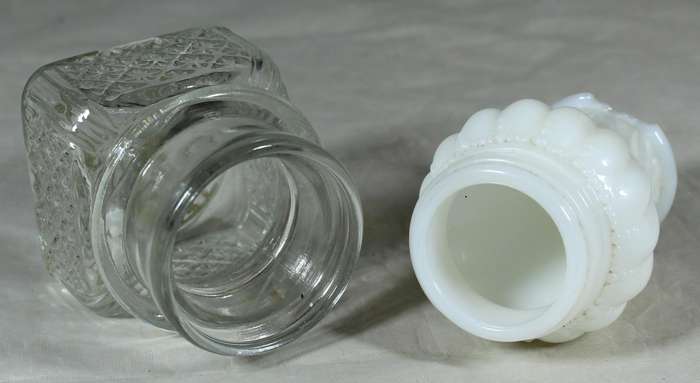 White glass bottle plus pressed glass bottle