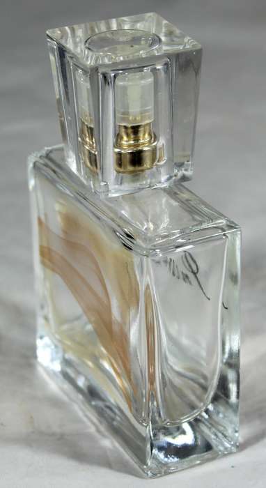 Perfume bottle - Avon Incandessence