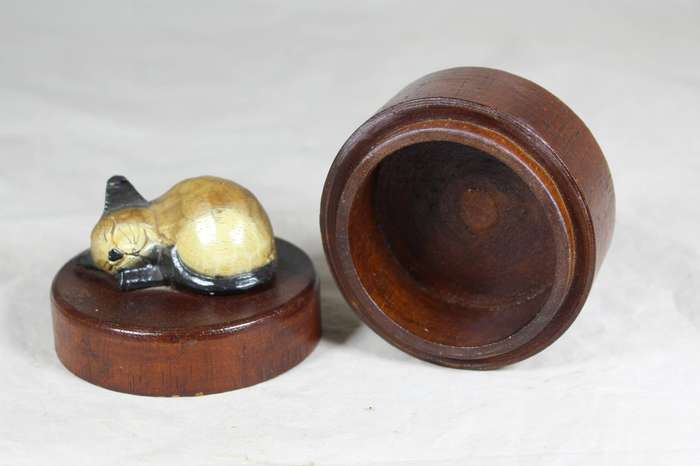 Trinket bowl with cat sleeping on lid