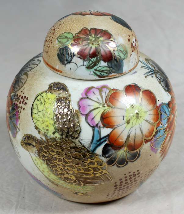Embossed and hand painter ginger jar