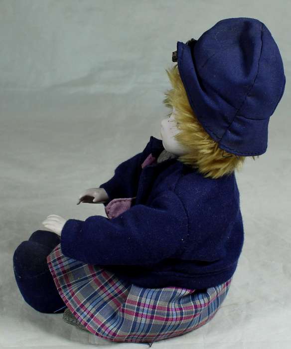 Little porcelain girl in retro clothing