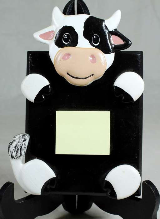 Ceramic cow with notepad