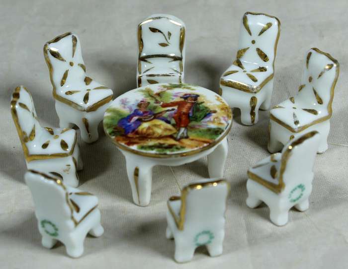 Miniature Limoges table with eight chairs