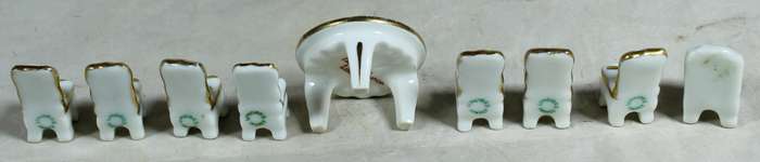 Miniature Limoges table with eight chairs
