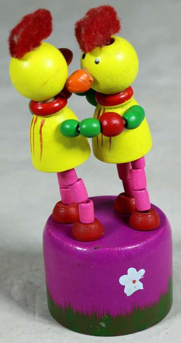 Dancing chickens with push mechanism