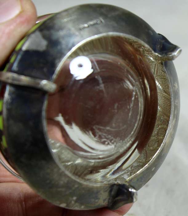 Glass and embossed metal trinket holder