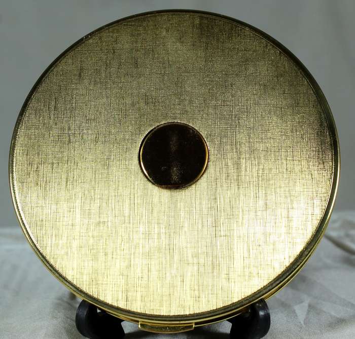 New golden powder compact
