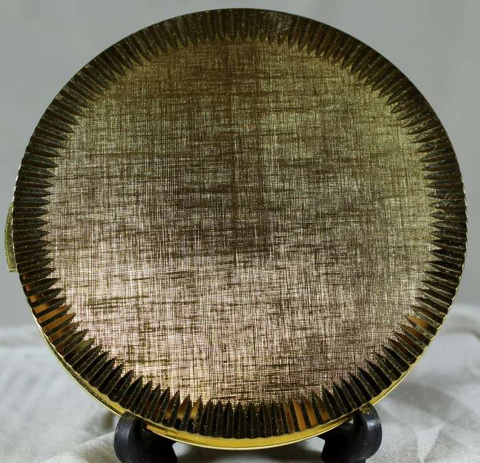 New golden powder compact