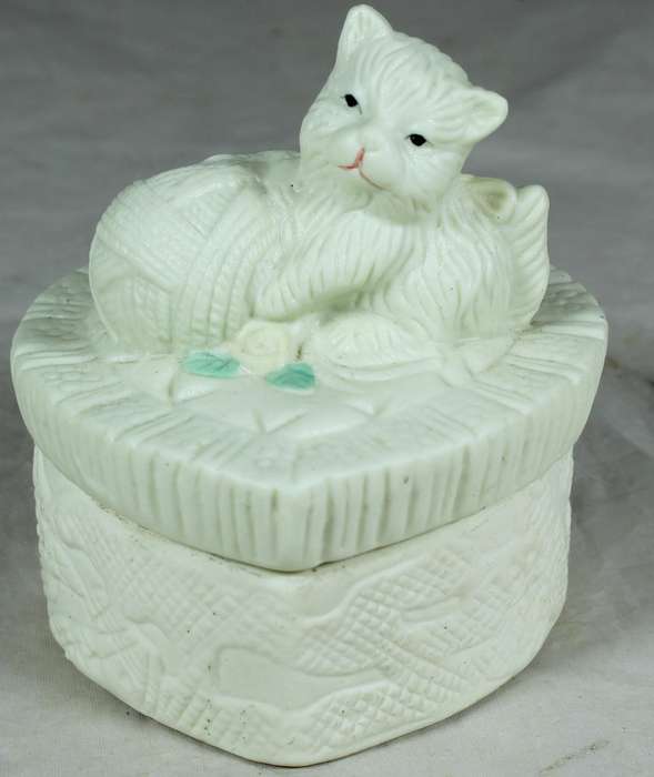 Lidded ceramic trinket box with cat playing with yarn ball