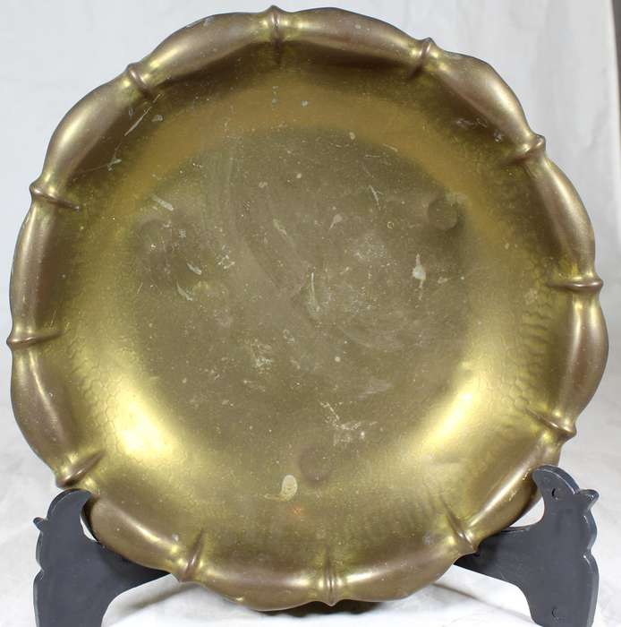 Footed brass bowl