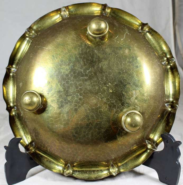 Footed brass bowl
