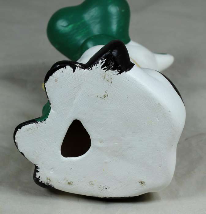 Seated smiling cow