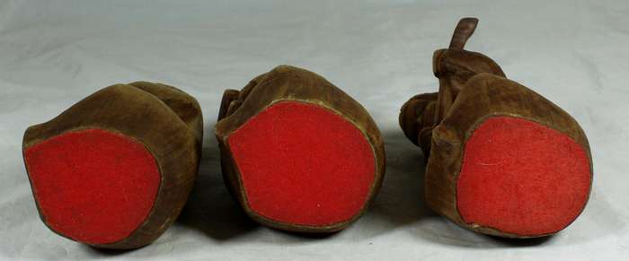 Trio of carved wooden musicians