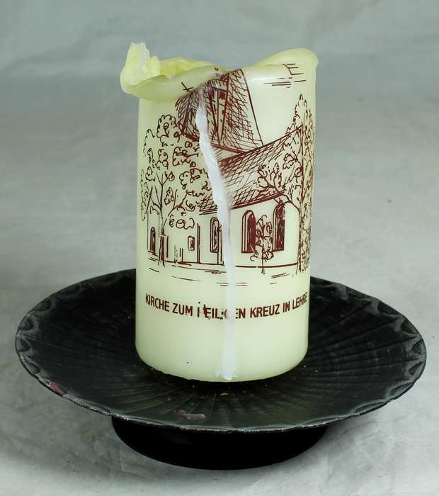 Candle on metal stand