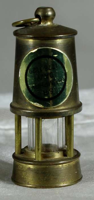 Miniature brass miners safety lamp