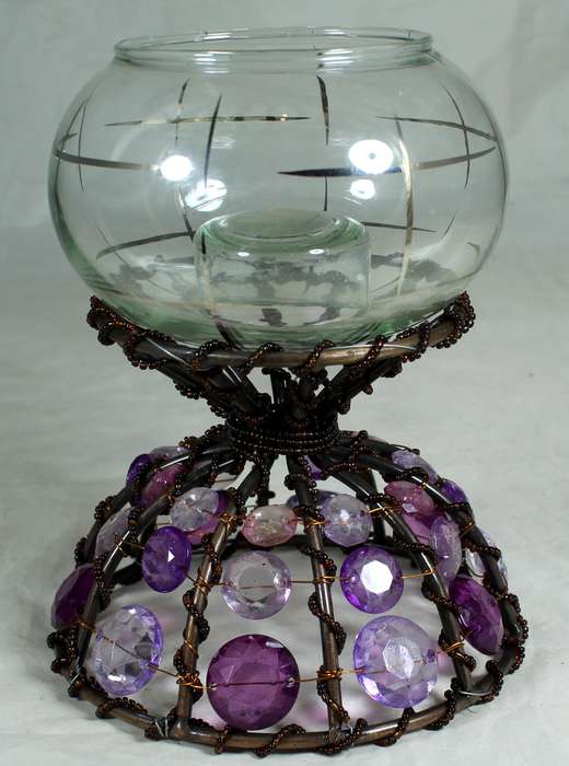 Bejeweled stand with vase