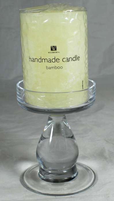 Glass stand with candle