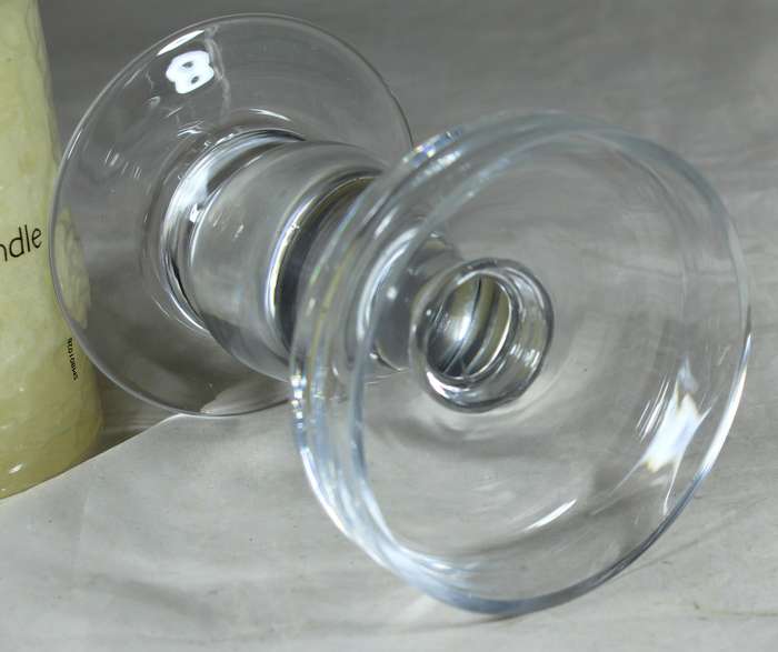 Glass stand with candle