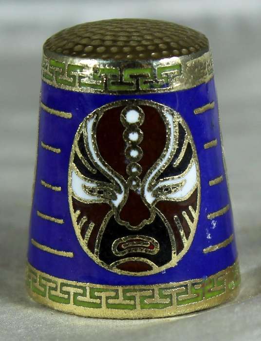 Cloissone thimble - oriental masks