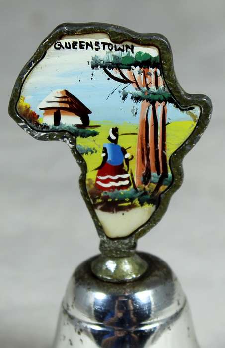 Souvenir silver plated bell - Queenstown with map of Africa