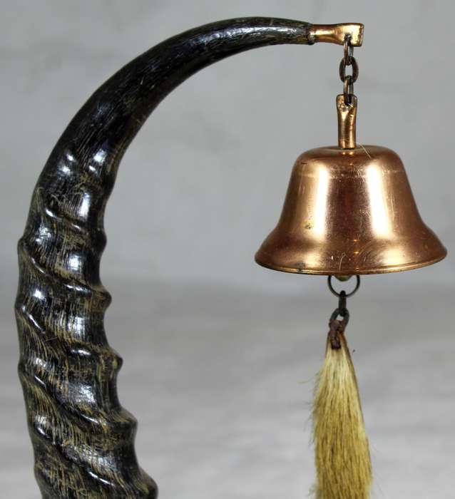 Composition horn and hide table bell