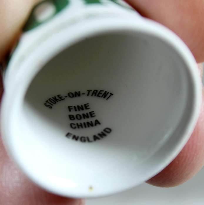 Bone China - Advertising thimble - Flora - Stoke-on-Trent
