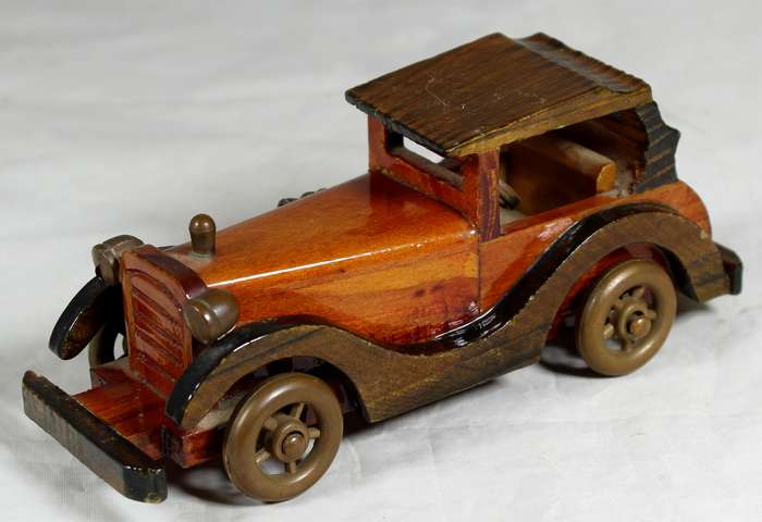 Carved wooden classical car