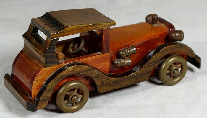 Carved wooden classical car