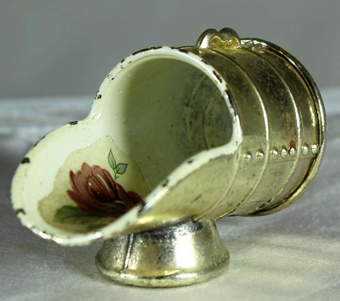Miniature brass and porcelain shuttle