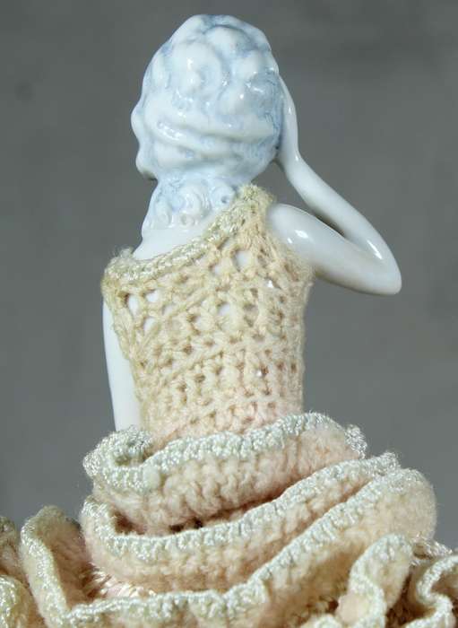 Half doll with pink dress