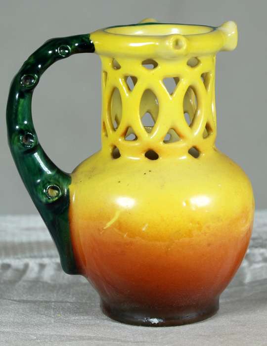 Miniature vase with painted city scene