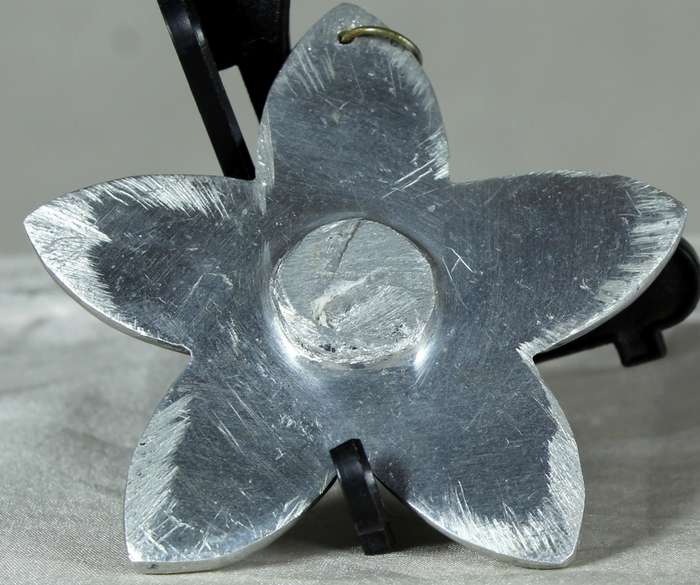 Metal flower pendant