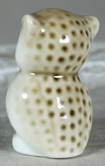Miniature glazed owl