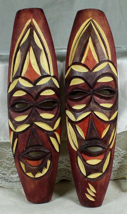 Pair of small wood carved masks