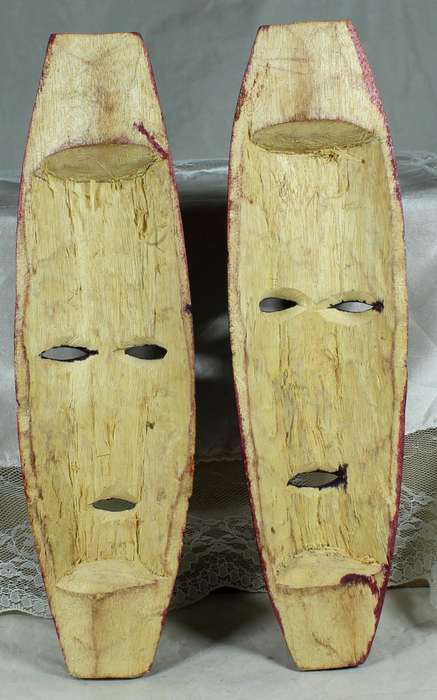Pair of small wood carved masks