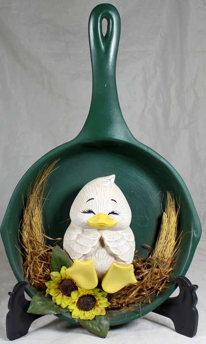 Chicklet in green frying pan